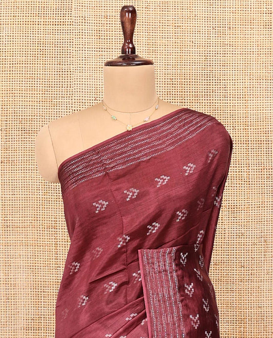 Maroon Banana Pith Saree, Finely Crafted with Buttas All Over Its Body, Subtle Self-Border of Stripes and Buttas, Pallu Steeped with Stripes, and Paired with a Matching Blouse