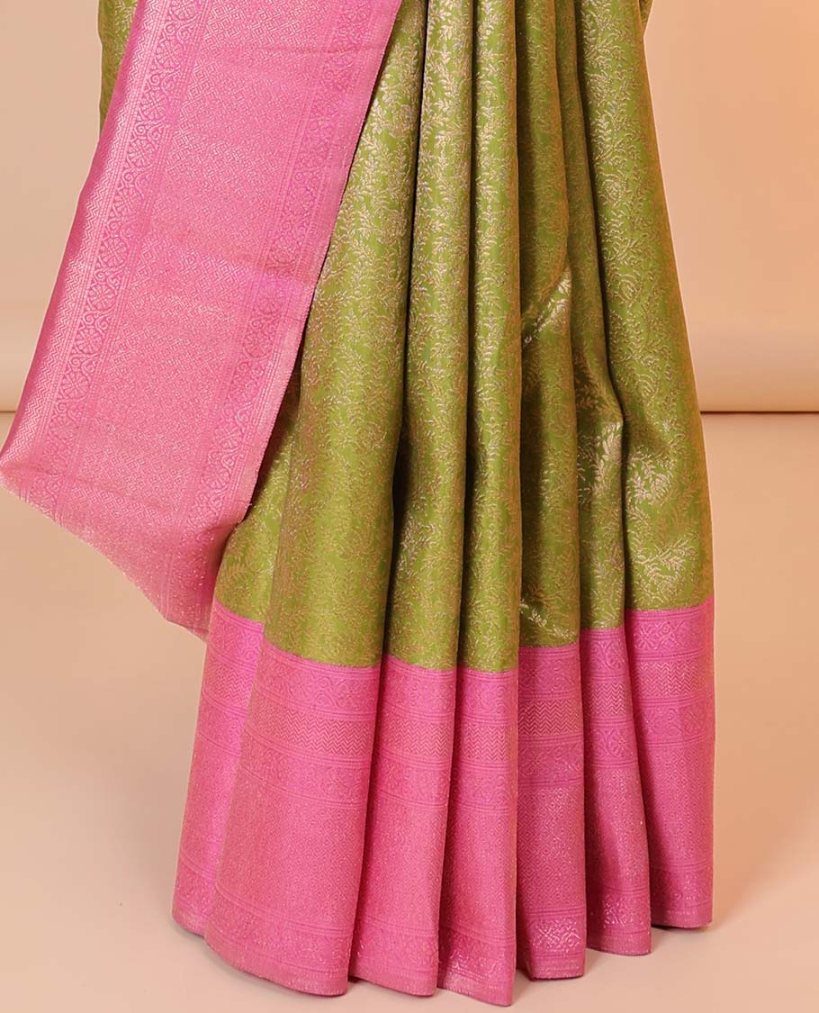 Green jacquard silk saree, contrast zari-enriched pallu & zari border of muthu,kodi visiry,vanki & mayil kann
