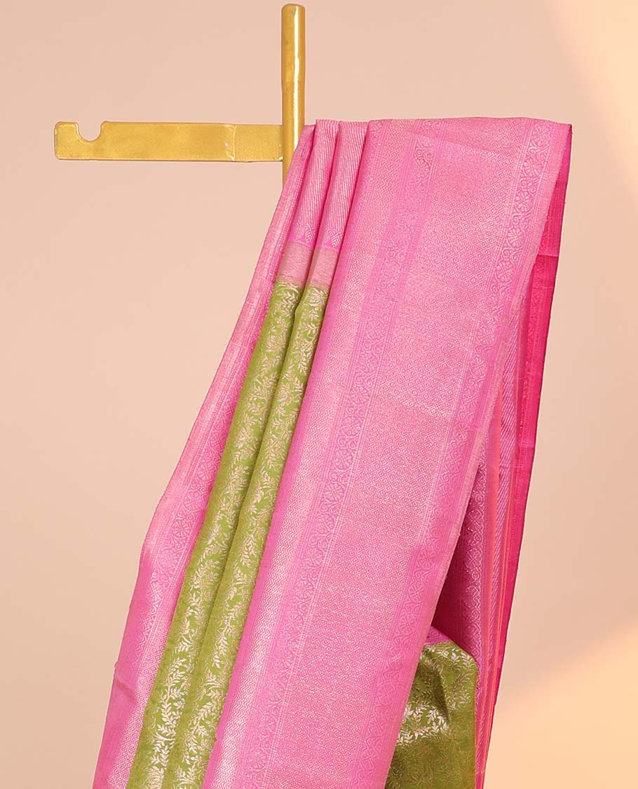 Green jacquard silk saree, contrast zari-enriched pallu & zari border of muthu,kodi visiry,vanki & mayil kann