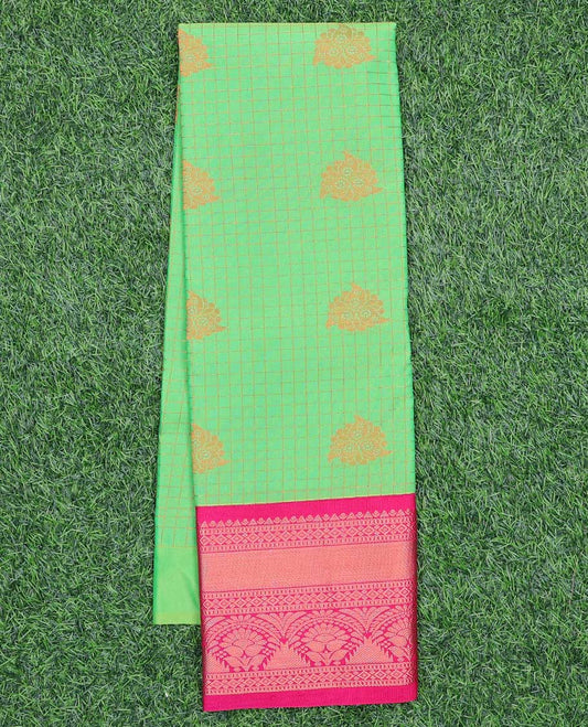 Gold floral jacquard art silk pavadai material with contrast blouse & zari border of traditional designs