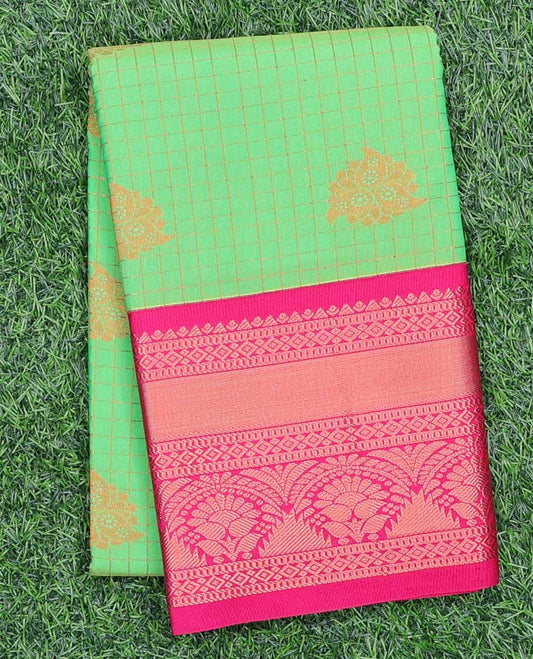 Gold floral jacquard art silk pavadai material with contrast blouse & zari border of traditional designs