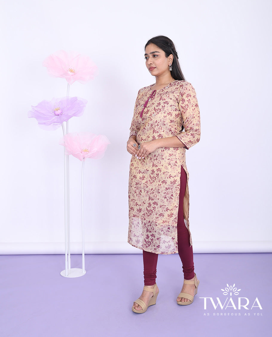 Twara gold floral-printed round neck with 3/4th sleeve tissue straight-cut below-knee kurti