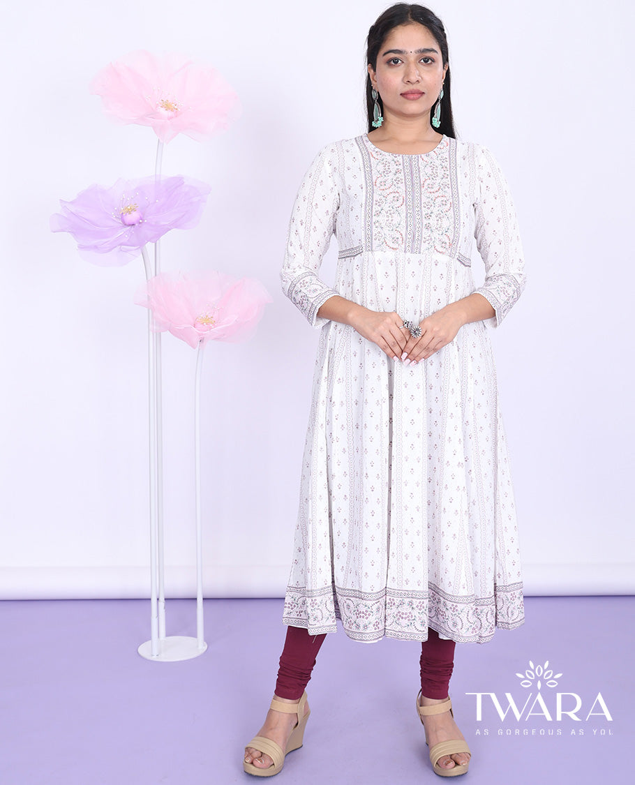 Twara cream unique motifs printed round neck with 3/4th sleeve cotton straight-cut below-knee kurti