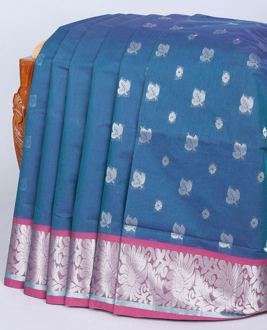 Blue venkatagiri cotton saree with leaf & floral buttas, contrast traditional design zari border & pallu of paisleys