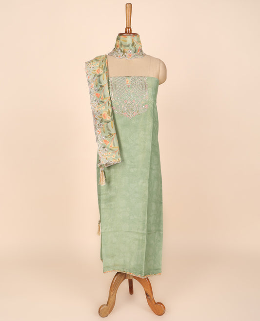 Green material churidar set, neck embroidery tissue top, plain bottom & floral vine print & scallop embroidered dupatta