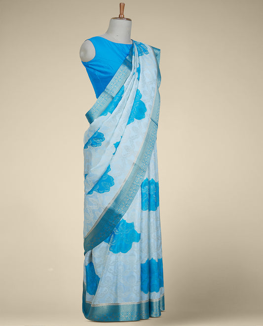 Blue floral motifs & jaal design Italian Crepe saree, contrast intricate design zari border