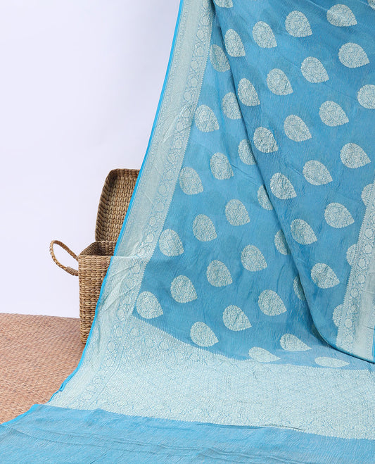 Blue crushed saree with unique buttas, self-border of traditional designs & pallu of intricate jaal designs