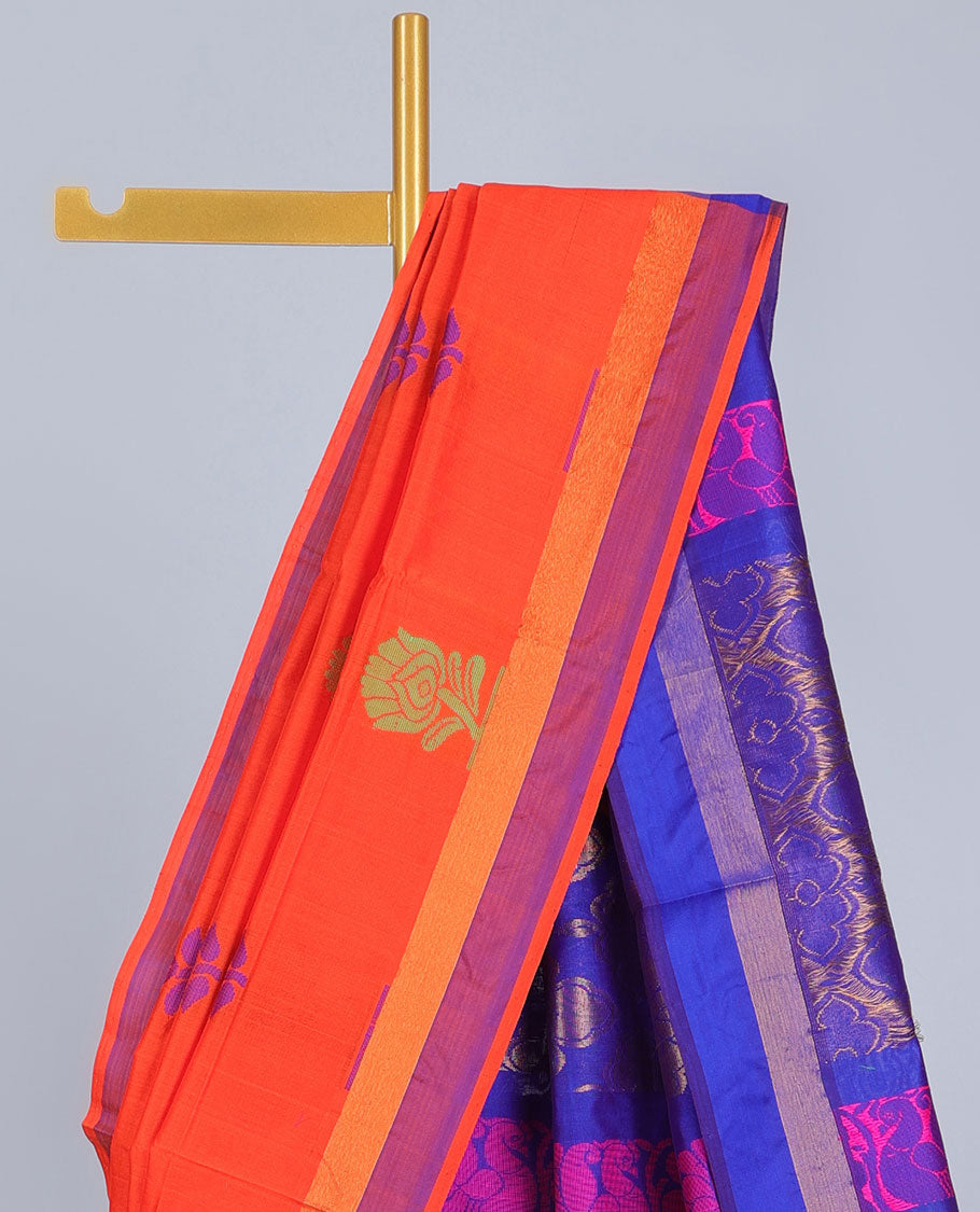 Orange kuppadam cotton saree with floral buttas, contrast border & pallu of floral & peacock designs