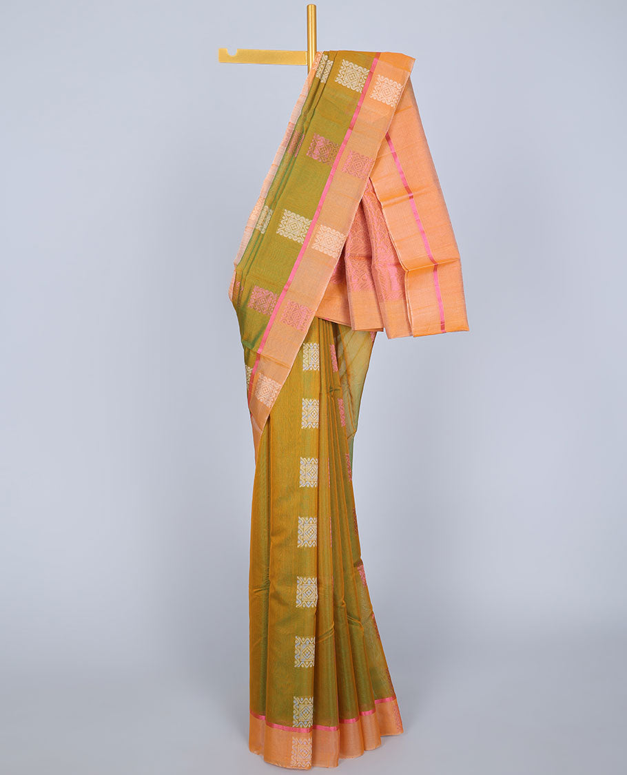 Green silk cotton saree with buttas, contrast unique design border & pallu of scallop designs