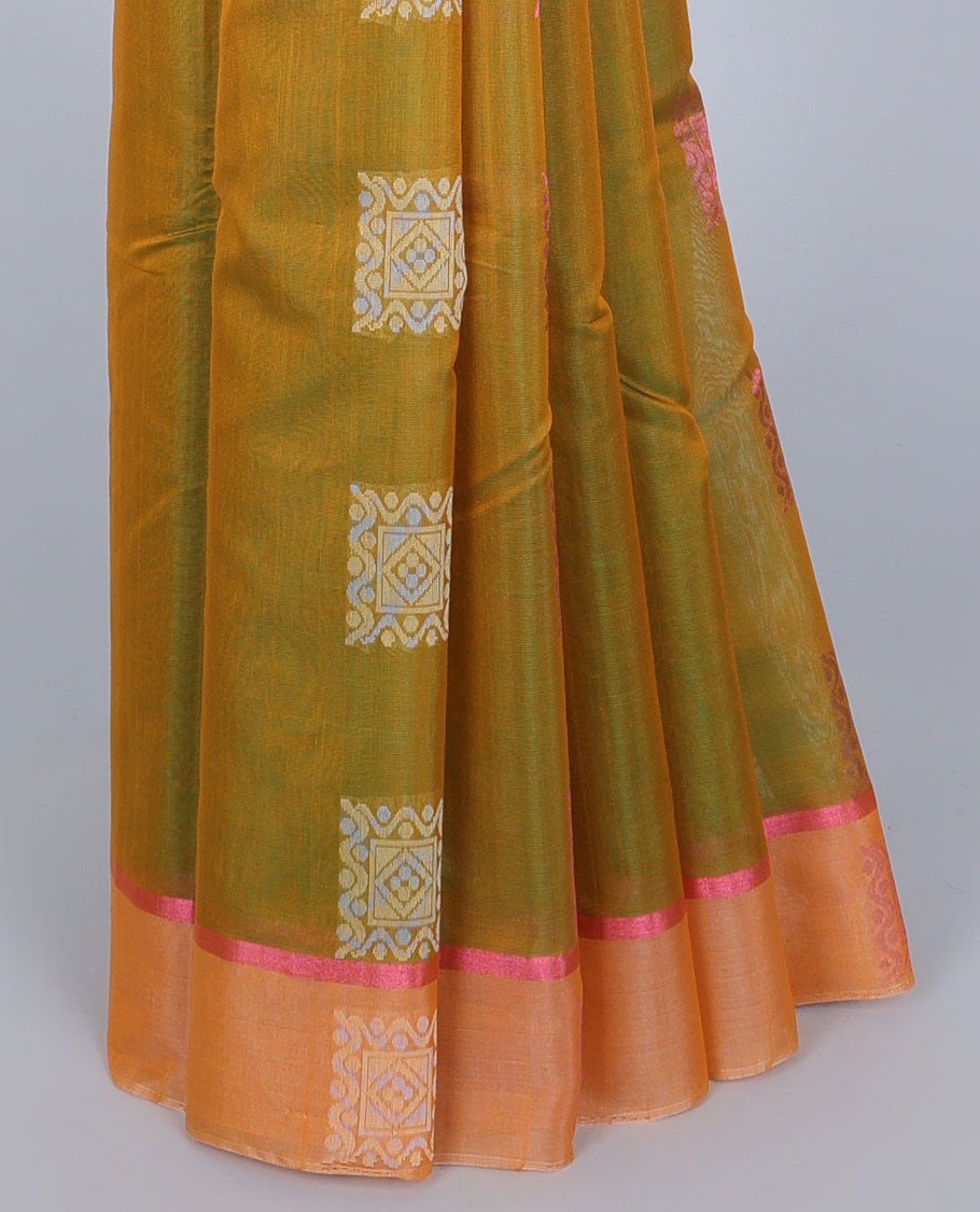 Green silk cotton saree with buttas, contrast unique design border & pallu of scallop designs