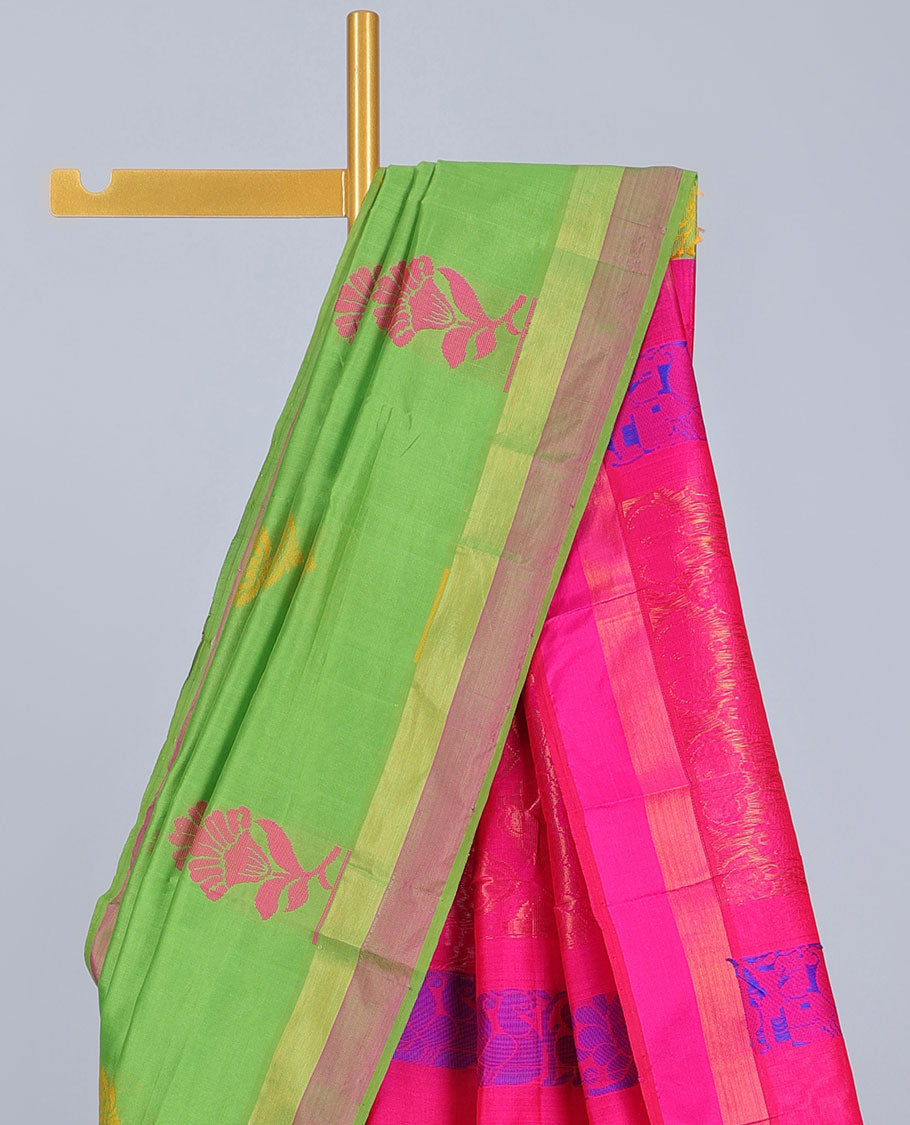Parrot green kuppadam cotton saree with floral buttas, contrast plain border & pallu of intricate designs