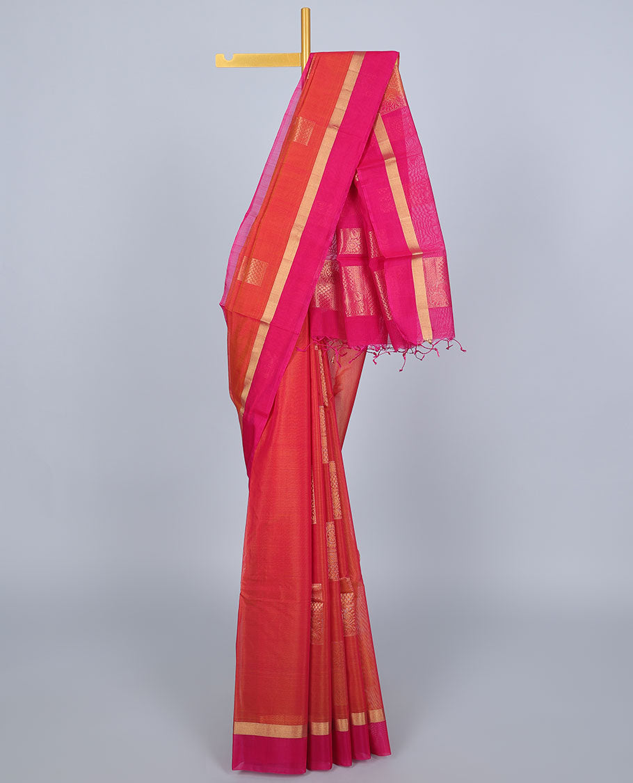 Orange silk cotton saree with zari buttas, contrast zari border & pallu of traditional designs
