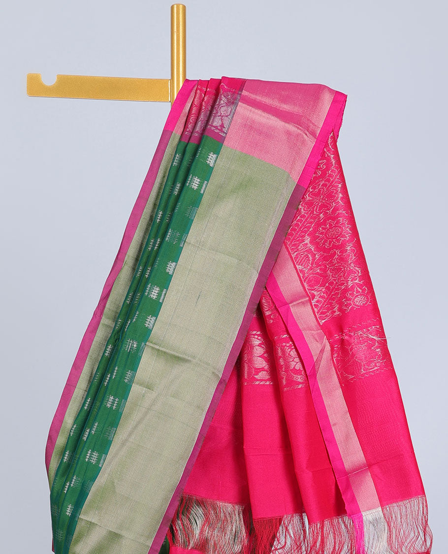 Green kupadam cotton saree with buttas, plain border & contrast pallu of intricate zari designs