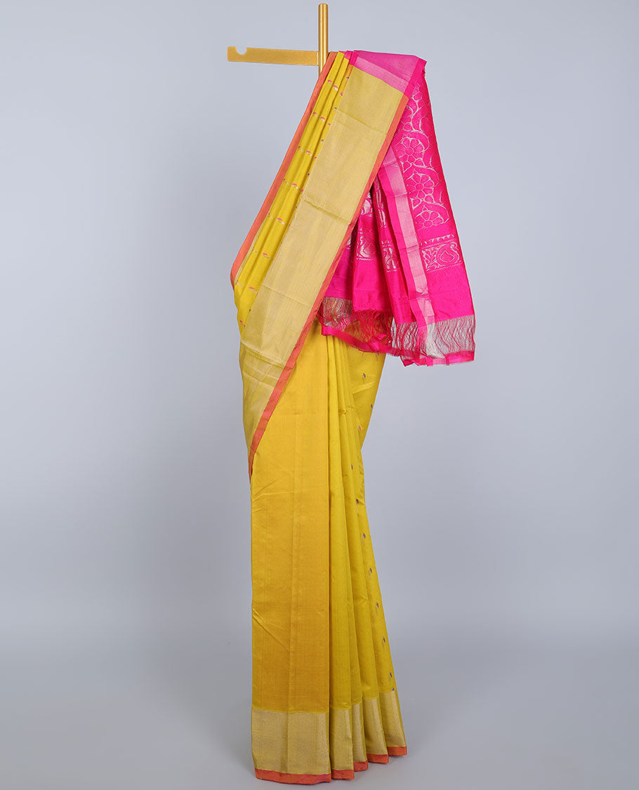 Yellow kupadam cotton saree with buttas, plain border & contrast pallu of floral designs