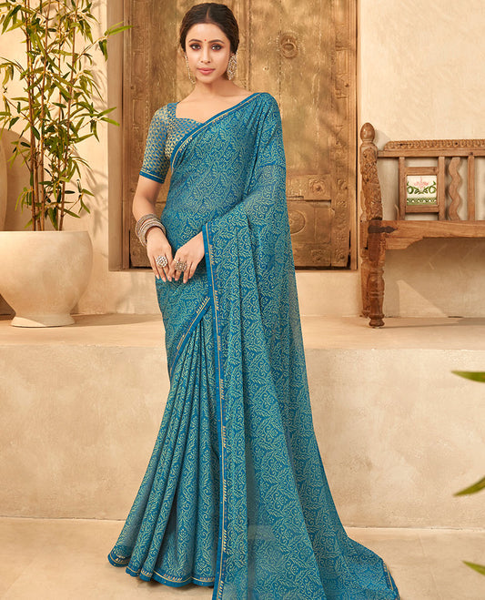 Blue intricate floral printed casual wear brasso saree, embroidered border