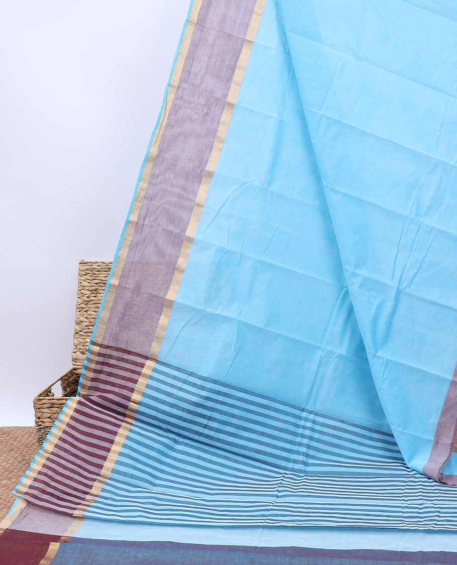 Pale blue plain design cotton saree, contrast zari border & pallu of stripes