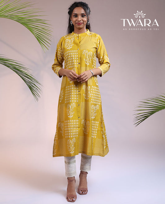 Twara yellow floral motifs with bandhani dots printed 3/4th sleeve & Chinese collar muslin straight-cut below-knee kurti