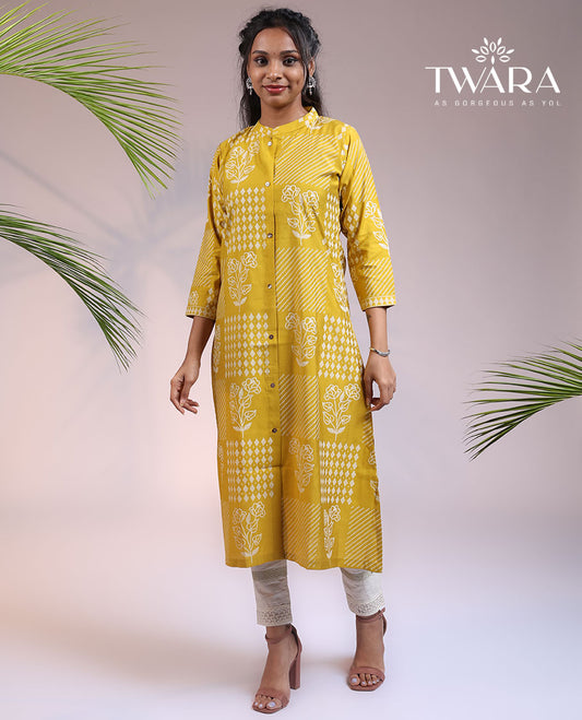 Twara yellow floral motifs with bandhani dots printed 3/4th sleeve & Chinese collar muslin straight-cut below-knee kurti