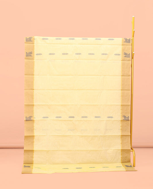 Yellow Kanchi Cotton Saree, Subtly Sparkled with Buttas All Over Its Body, Complemented by Contrast Border, Pallu of Floral Designs, and Paired with a Matching Blouse