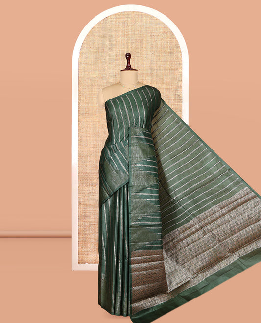 Borderless Green Tusser Silk Saree, Embellished with Zari Stripes and Temple Design, a Grand Jaal Pallu, and a Matching Blouse