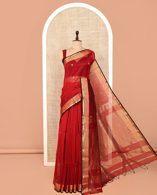 Red Maheshwari Cotton Saree, Ornamented with Zari Buttas on Its Body, Highlighted by Traditional Zari Border, Scintillating Pallu Steeped with Zari Stripes, and Paired with a Matching Blouse