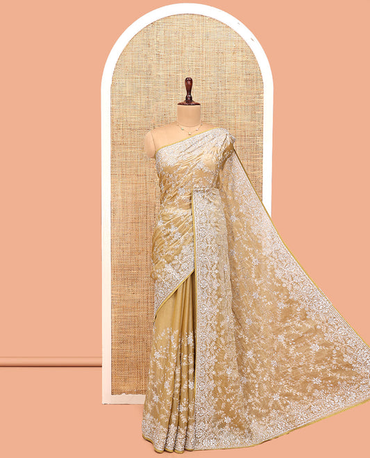 Champagne Gold Designer Saree, Gleamed up with Floral Vine Stone Embroidery, a Stone Embroidered Border, and a Matching Blouse
