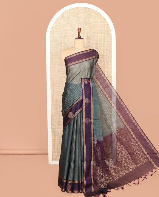 Grey Silk Cotton Saree, Subtly Sparkled With Stripes All Over Its Body Complemented by Contrast Zari Motifs Woven Border, Geometric Patterned Pallu and Paired with a Contrast Blouse