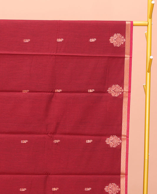 Crimson Red Semi-Silk Cotton Saree, Enriched with Zari Buttas All Over Its Body, a Subtle Zari Piping Border, Complemented by Contrast Pallu of Peacock Butta Enclosed Checked Design, and Paired with a Contrast Blouse