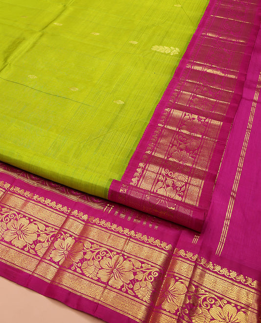 Green Kanchipuram Silk Saree, Sparsely Woven with Zari Buttas on Its Body, Complemented by a Contrast One-Sided Korvai Border of Manga Mokku, Banaras, Diamond and Kodi Visiry Designs, Pallu of Floral Jaal Designs, and Comes Without a Blouse
