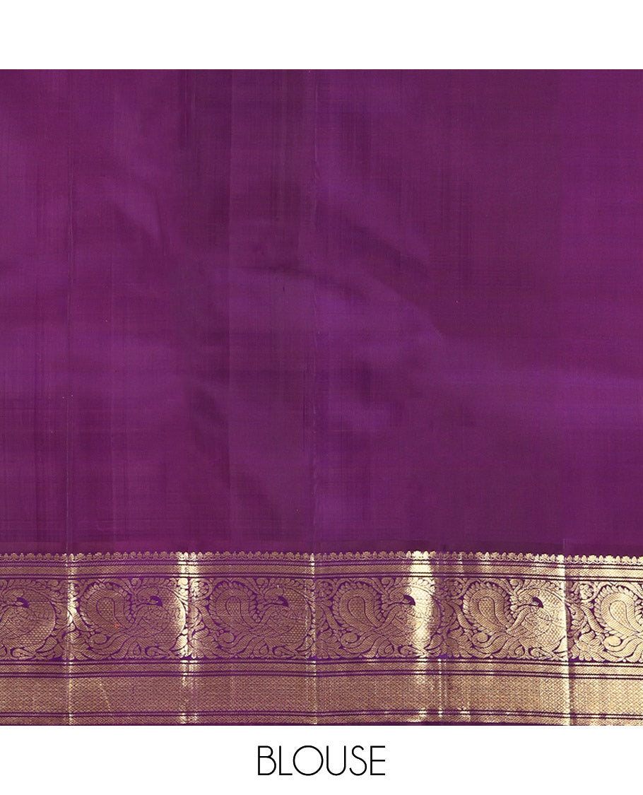 Blue Kanchipuram Silk Saree, Features Zari Buttas All Over Its Body, Complemented by a Contrast Border of Mayil Kann, Mayil, and Jaal Designs, Grand Jaal Pallu, and Paired with a Contrast Blouse
