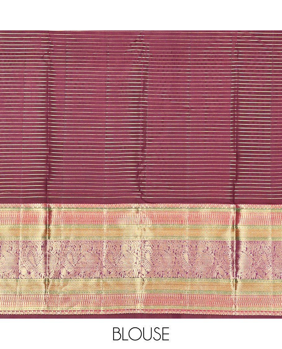 Maroon Vasundhara Lite Silk Mix Saree, Adorned with Zari Butta Enclosed Checks, a Zari Border of Rekku, Kuyil Kann, and Mayil Designs, Grand Pallu, and a Matching Blouse