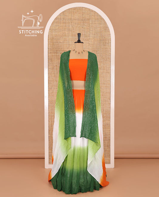 Multi-color half-saree, Indian flag theme ombre-colored viscose georgette skirt, a plain orange blouse, and a tri-colored zari striped dhavani