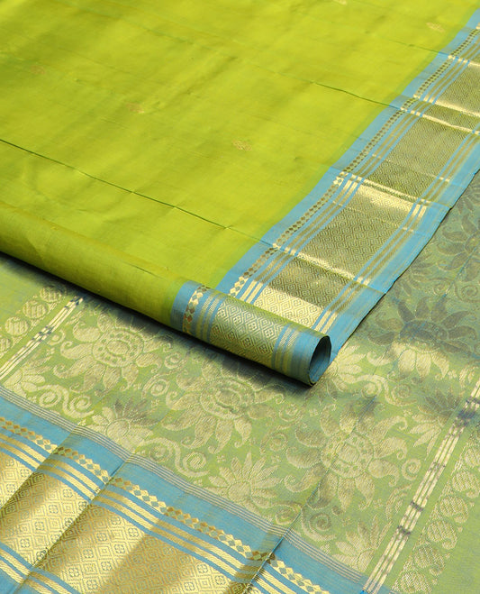 Parrot green zari buttas kanchipuram silk saree, contrast one-sided border of panner sombu,banaras & jaal & floral design pallu