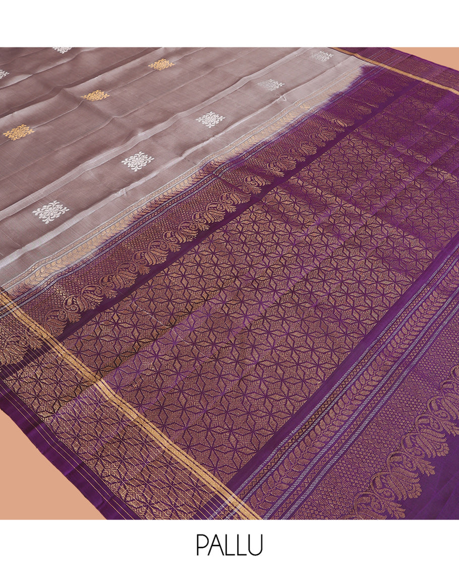 Grey Mayuri Lite Silk Mix Saree, Embellished with Zari Buttas, Complemented By Contrast Zari Striped Border, a Grand Geometric Pallu, and a Contrast Blouse