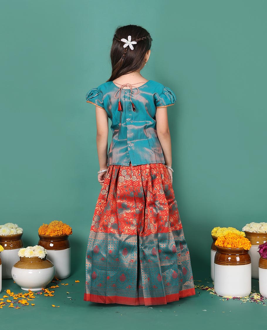 Rust art silk pavadai readymade set, jacquard with contrast traditional zari border skirt, contrast jacquard embroidered round neck puff-sleeve blouse