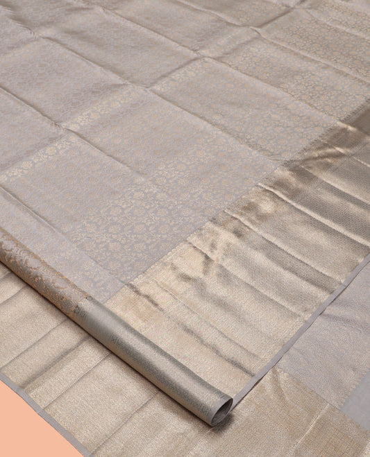 Grey Kanchipuram Wedding Silk Saree Features Jacquard Design, a Zari Border of Thilakam Mokku, Vanki, and Jaal Designs, Grand Pallu, and a Matching Blouse
