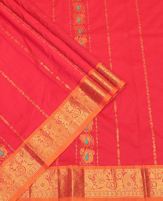 Red Art Silk Pavadai Material Set, Enriched with Zari Designs on Its Skirt, Complemented by a Contrast Paisley Zari Border, and a Matching Blouse