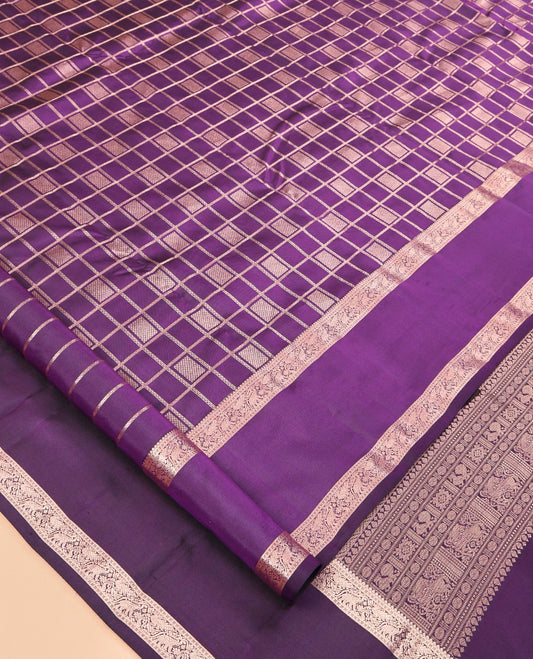 Purple Vasundhara Silk Saree, Decorated with a Zari Checked Design, Highlighted by a Zari Rettai Pettu Border of Yaanai Designs, Jaal Pallu, and a Matching Blouse
