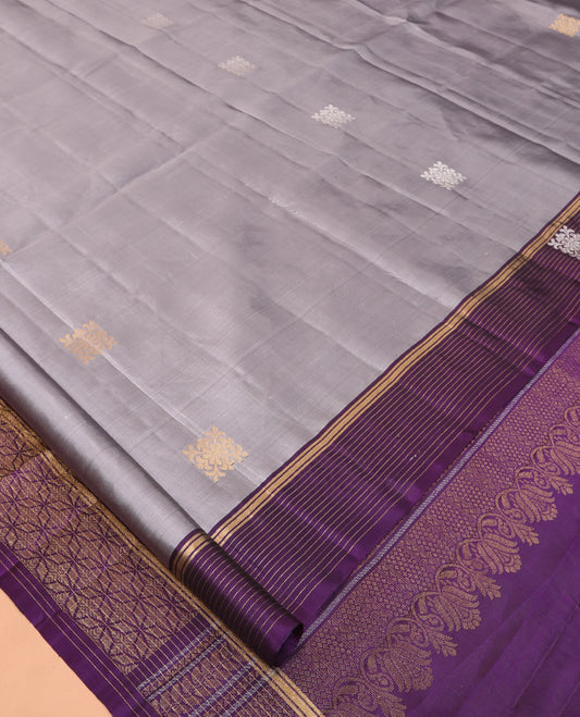 Grey Mayuri Lite Silk Mix Saree, Embellished with Zari Buttas, Complemented By Contrast Zari Striped Border, a Grand Geometric Pallu, and a Contrast Blouse
