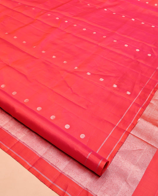 Coral Pink Mayuri Soft Silk Saree, Artfully Woven with Mayil and Chakram Buttas All Over Its Body, Subtle Zari Border, Grand Pallu and Paired with a Matching Blouse