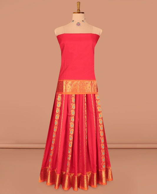 Red Art Silk Pavadai Material Set, Enriched with Zari Designs on Its Skirt, Complemented by a Contrast Paisley Zari Border, and a Matching Blouse