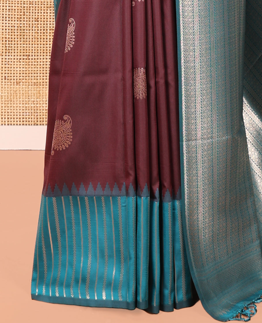 Wine Elite Soft Silk Saree, Elevated with Zari Buttas All Over Its Body, Complemented by Contrast Border Steeped with Geometric Patterns, Grand Pallu, and Paired with a Contrast Blouse