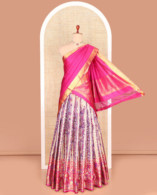 Purple Pure Silk Half-Saree Richly Detailed with Floral Jacquard Design on Its Skirt, Complemented by a Contrast Meenakari Border Featuring Mayil and Yaanai Designs, Comes with a Contrast Jacquard Blouse and a Dhavani of Manga Designs