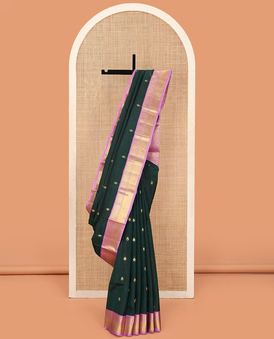 Green Vasundhara Lite Silk Mix Saree Enthralled with Zari Buttas, Featuring a Contrast Border with Thazampoo Rekku, Muthu, Mayil, and Paisa Designs, a Jaal Design Pallu, Paired with a Contrast Blouse