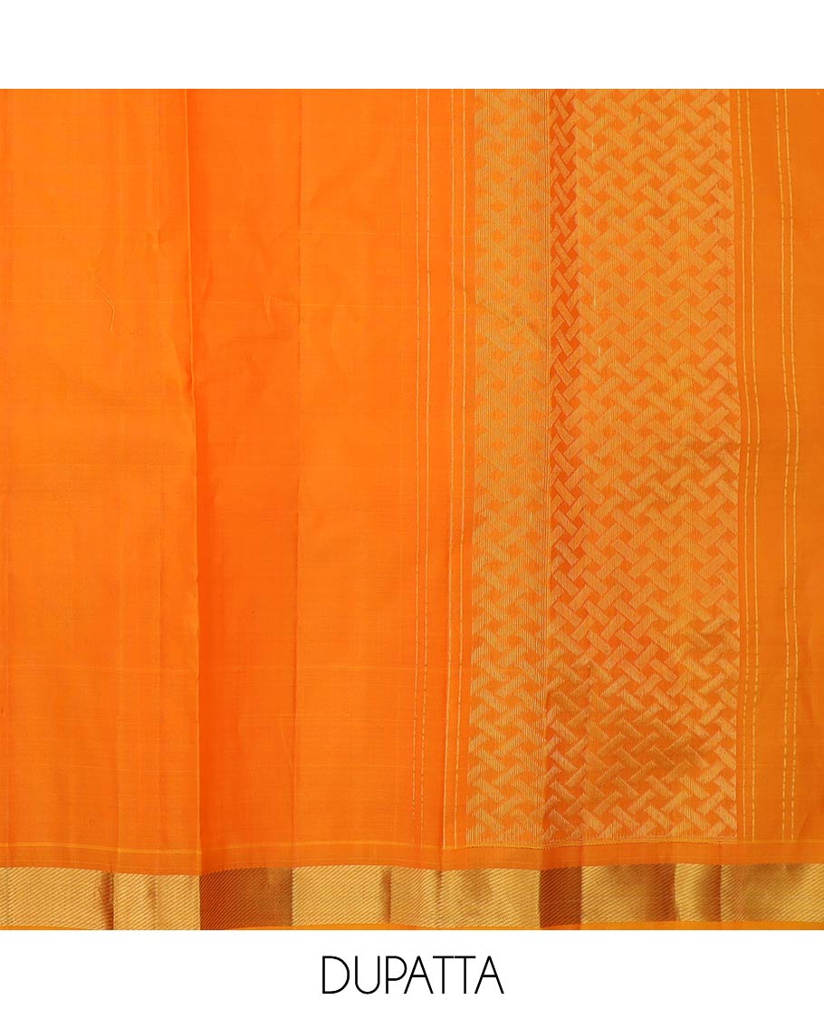 Orange pure-silk half-saree, zari buttas and checked skirt, contrast kodi visiry border, zari design blouse, and a intricate zari woven dhavani