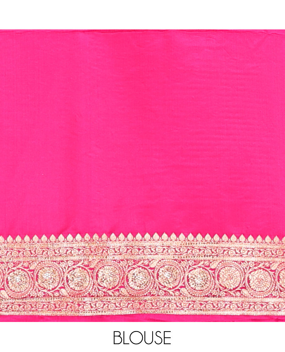 Orange Banarasi Satin Saree, Mesmerized with Floral Jaal Jacquard, a Contrast Floral Creeper Border, Intricate Stonework Pallu, and a Contrast Blouse