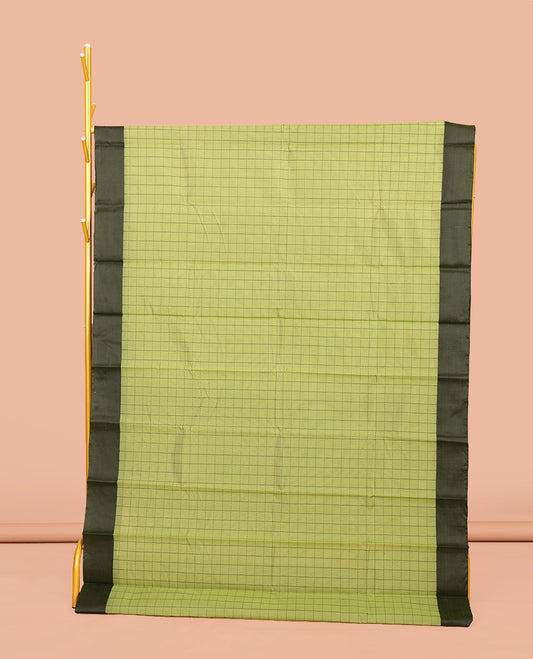 Green Semi-Silk Cotton Saree, Subtly Sparkled with Checks All Over Its Body, Complemented by a Contrast Border, Striped Pallu, and Paired with a Matching Blouse