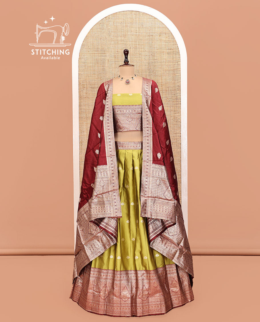 Green Art Silk Half Saree, Adorned with Buttas Skirt, Contrast Traditional Border, Matching Blouse, and a Contrast Banaras Dhavani