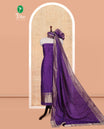 Purple Semi-Silk Material Churidar Features Zari Buttas Woven Top, a Santoon Bottom, and Zari Design Dupatta
