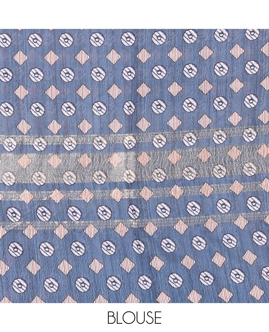 Grey Madhubani village theme printed moss crush saree, double-sided zari border, Madhubani village printed pallu, and a geometric buttas printed blouse